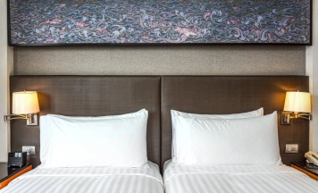 Двухместный номер Deluxe c 1 комнатой с балконом (2 отдельные кровати) в Chatrium Sathon Bangkok