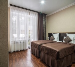 Номер стандарт с 2 односпальными кроватями в Таурух