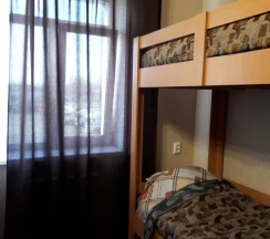 Кровать в общем номере в Байкал