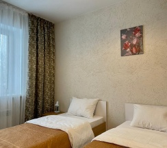 Номер стандарт с 2 односпальными кроватями в Long House