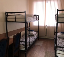 Кровать в общем номере в Домино