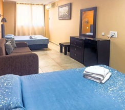Двухместный номер Deluxe King двуспальная кровать в Laguardia Hotel