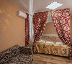 Номер люкс с 1 двуспальной кроватью в Изумруд