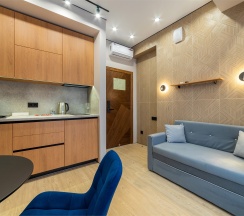 Апартамент с диваном в Булгаков by Sateen group