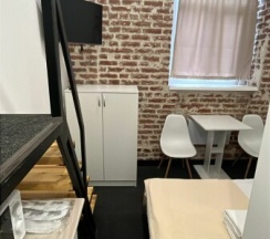 Трехместный номер Лофт с двуспальной и раскладным креслом/кроватью в Лофт отель на Крымской