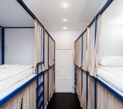 Место в 8-местном общем номере “Русская классика” в BookCase Hostel