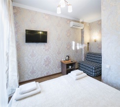 Двухместный номер с креслом кровать в Тих Отель