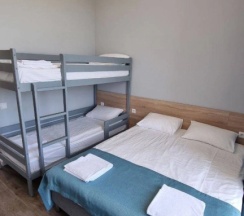 Четырёхместный номер Standard с балконом и с красивым видом из окна в Отель BlackSeaHotel Ldzaa