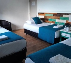 Трёхместный номер Standard c 1 комнатой в Hostal Buenavista Patagonia