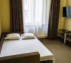 Номер стандарт семейный с 1 двуспальной кроватью в Оптима