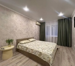 Двухместные апартаменты c 1 комнатой с балконом (двуспальная кровать) в Квартира Уютная в Центре