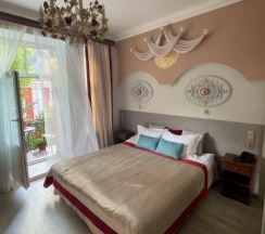 Номер "Романтик" с балконом Balcony Deluxe Room Dbl/Sngl в Trezzini