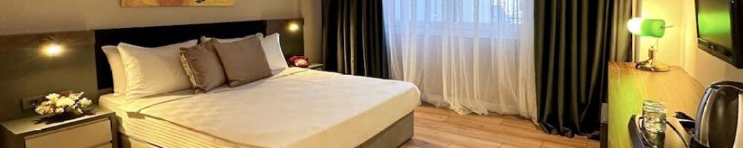 Двухместный номер Deluxe c 1 комнатой с балконом и с видом на город двуспальная кровать в Отель The Royals