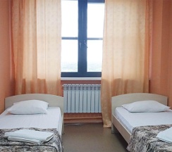 Кровать в 3-местном общем номере в Smart Hotel KDO Пенза