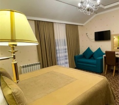 Трехместный номер стандарт в Сказка снежных вершин