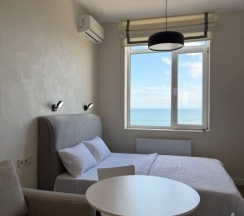 Уютная студия на 13 этаже с панорамным видом на Каспийское море. в Как Дома 05