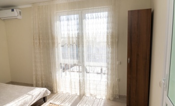 Апартаменты с 2 комнатами с балконом в Уют