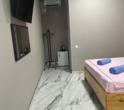 Четырёхместный номер Comfort с балконом в Regan