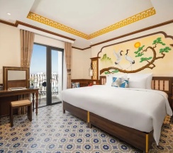 Четырёхместный номер Premium с балконом и с видом на реку в Soluna D'Annam - The Art of Hoi An Relaxation