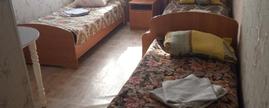Кровать в 3-местном общем номере в Вираж