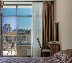 Двухкомнатный DeLuxe с одной спальней (6 этаж) в Real Apartments Sochi