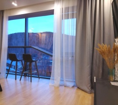 Студия Superior с красивым видом из окна в Baikal Hill Residence