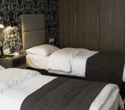 Двухместный номер "Делюкс" с 2 отдельными кроватями в Concept Hotel