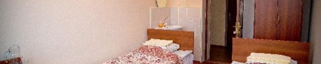 Номер стандарт с 2 односпальными кроватями (удобства на этаже) в Ивдель