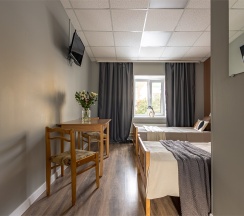 Стандартный  номер с 2 кроватями и собственной ванной в Номера в Гатчине