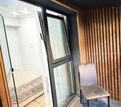 Апартаменты двухкомнатные (ЛЮКС) с балконом и красивым видом в Polikariya