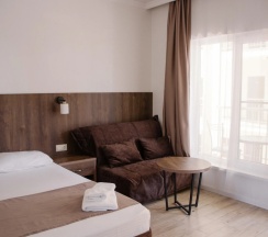 Трёхместный номер Deluxe с балконом в Талион