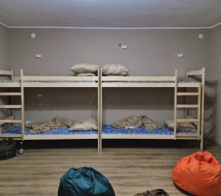 Кровать в 12-местном общем номере в Key2Home
