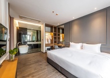 Люкс c 1 комнатой с видом на бассейн в One Patio Hotel Pattaya