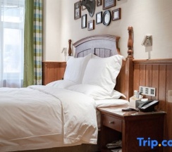 Двухместный номер Standard двуспальная кровать в Yake Town Holiday Hotel (Dehui Branch)
