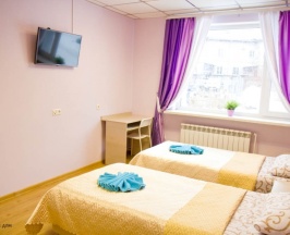 Двухместный номер с 2 отдельными кроватями и общей ванной комнатой в Альянс