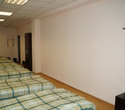 Кровать в общем номере в Натали