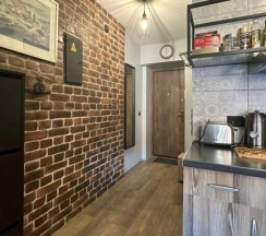 Апартаменты c 1 комнатой с балконом и с видом на город в Квартира в центре Loft