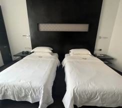 Двухместный номер Business с видом на сад (двуспальная кровать) в Guangdong Nanmei Osotto Hotel