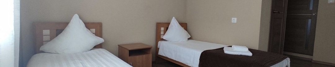 Двухместный номер с 2 односпальными кроватями в Нерпенок