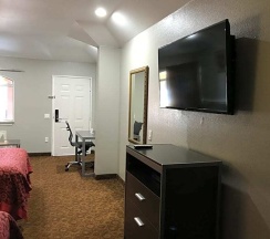 Двухместный номер Deluxe двуспальная кровать в Camelot Inn & Suites Veterans Memorial NW Houston