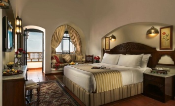 Двухместный номер Deluxe с видом на море двуспальная кровать в Mövenpick Resort Sharm El Sheik Naama Bay