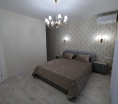 Шестиместный коттедж с балконом и рядом с пляжем в Гостевой дом