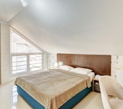 Комната стандарт с 1 двуспальной кроватью (мансарда) в Белая Лилия