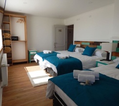 Трёхместный номер Standard c 1 комнатой в Hostal Buenavista Patagonia
