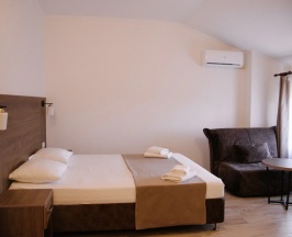 Трёхместный номер Standard Мансарда в Талион