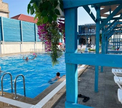 Семейный люкс SANTORINI с видом на море в Santorini Family Club