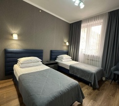 Номер стандарт с 2 односпальными кроватями в Альпина