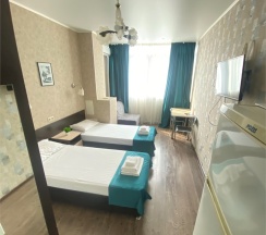 Трехместный номер с кухонной зоной в Joy apartments