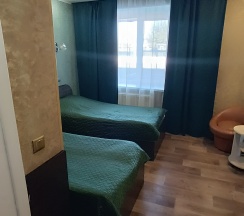 Двухместный номер с 2 односпальными кроватями в Мател