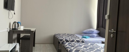 Номер стандарт с 2 односпальными кроватями в SV
